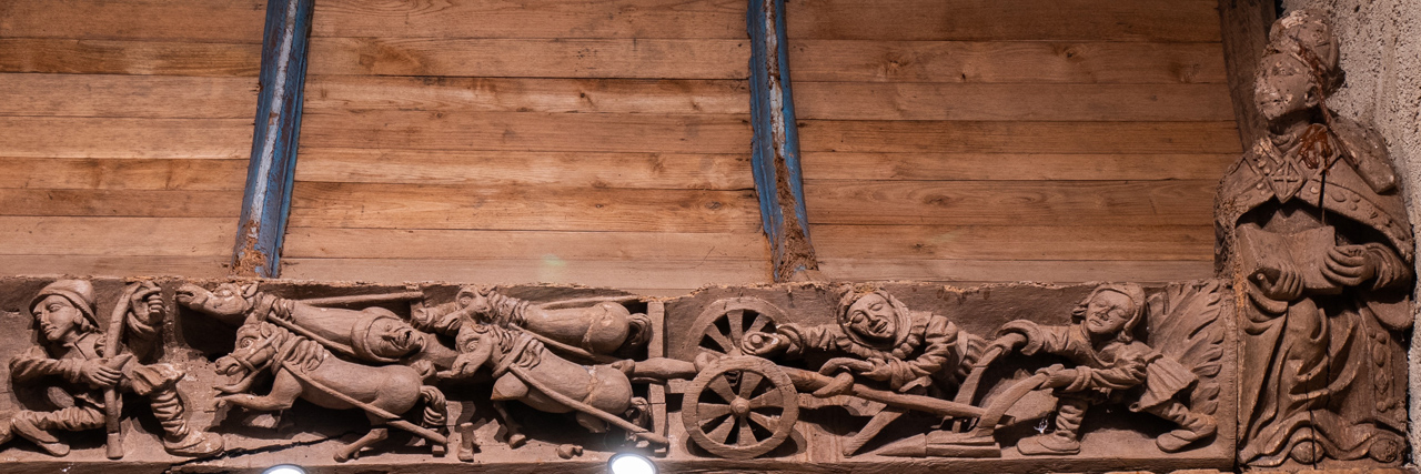 Dachbalken mit der Legende des reichen Bauern (16. Jh.)