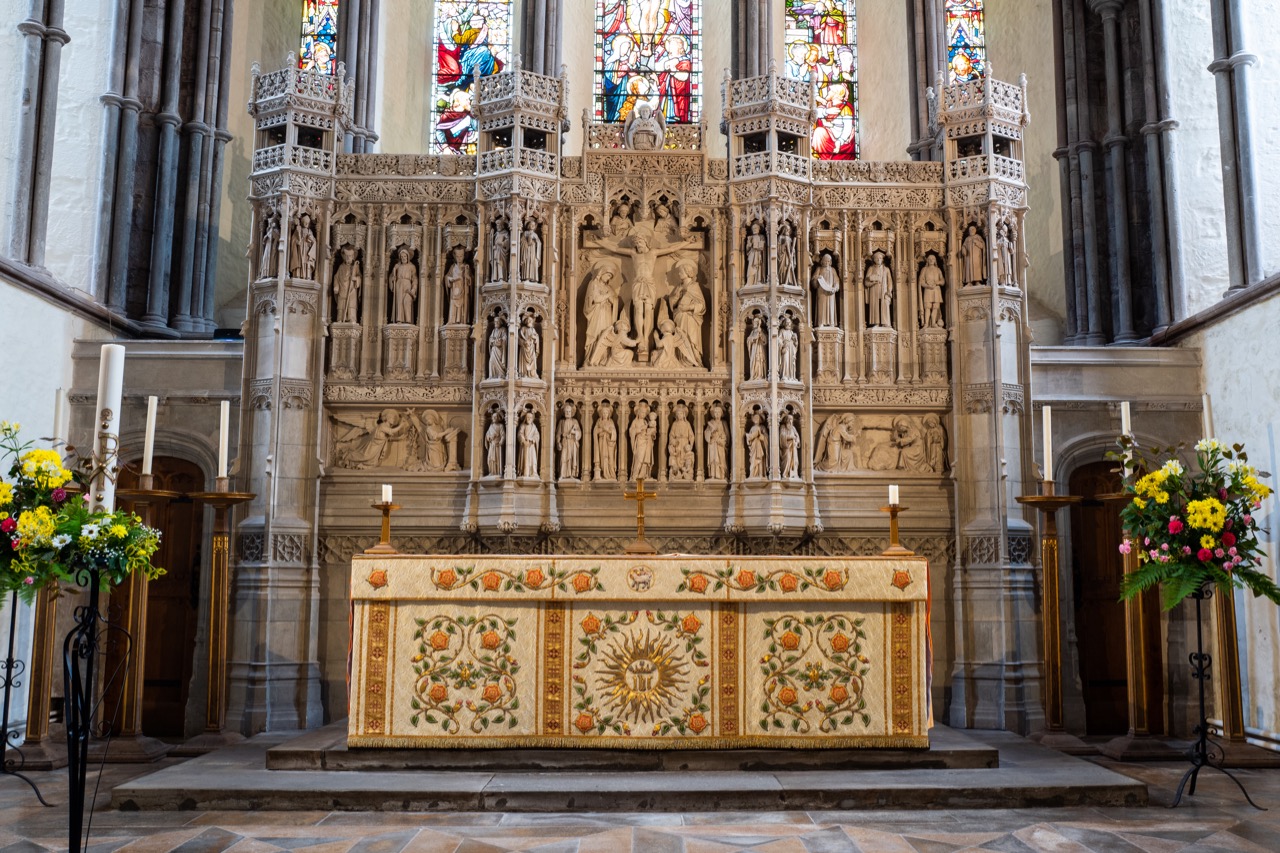 Altar (reredos by W. D. Caröe)