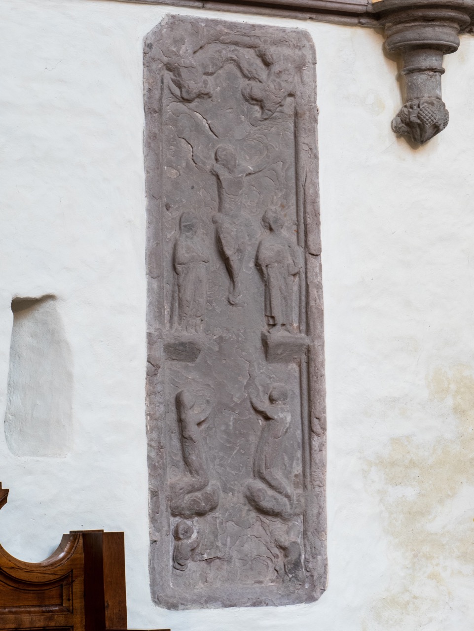 Medieval stone slab in the choir (probably an ancient altarpiece)