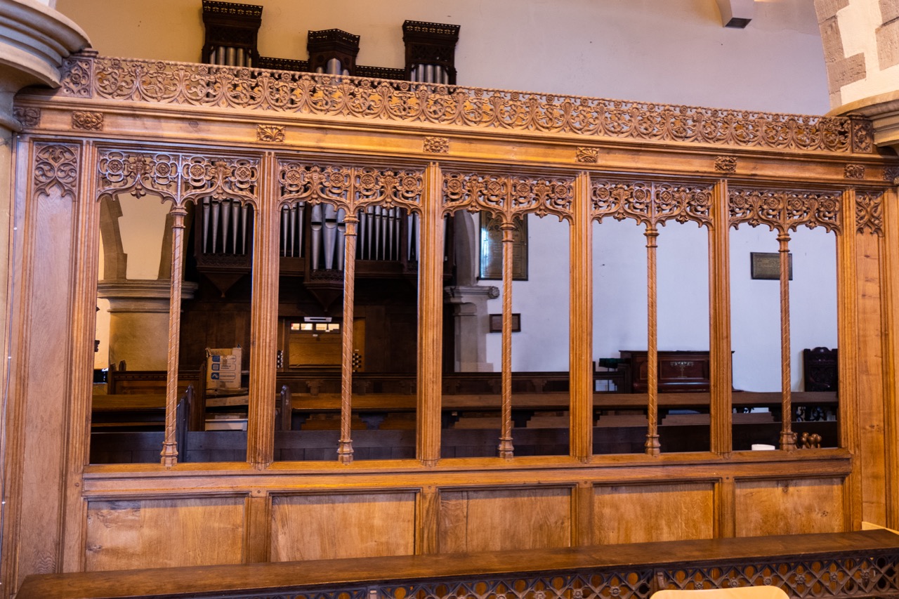 Back side of the choir stalls (W. D. Caröe)