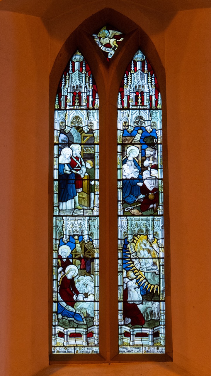 Window in the south wall with Nativity scenes (W. D. Caröe)