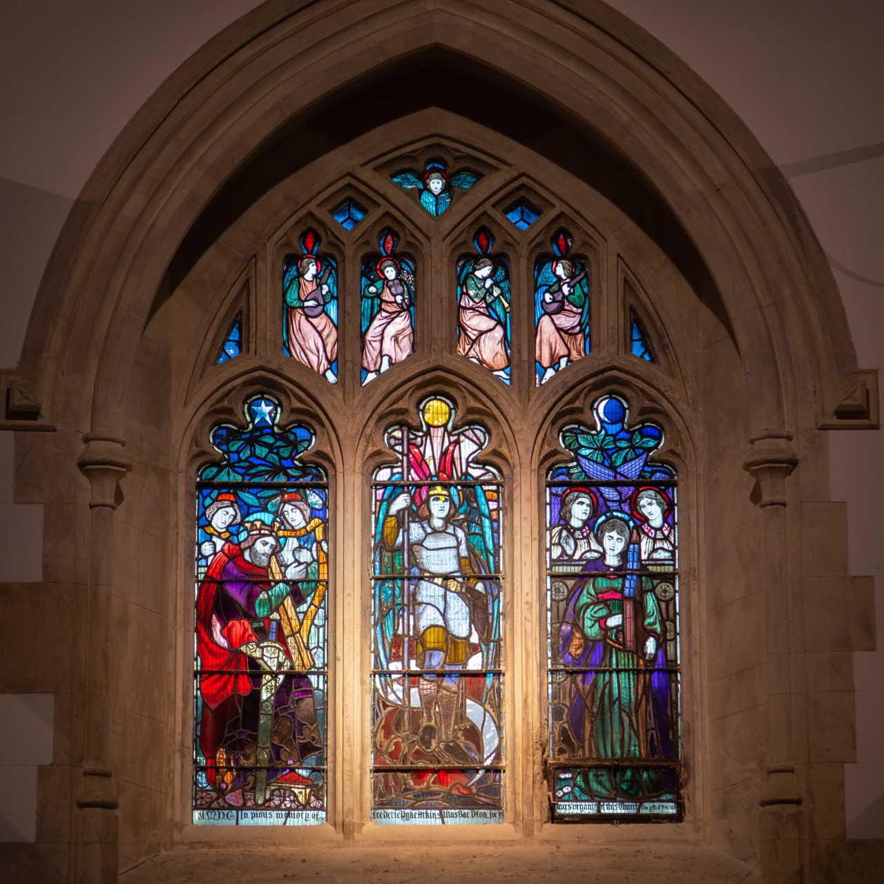 Stained glass window in the north aisle by Morris & Co. (1869, top row of apostles by William Morris himself)