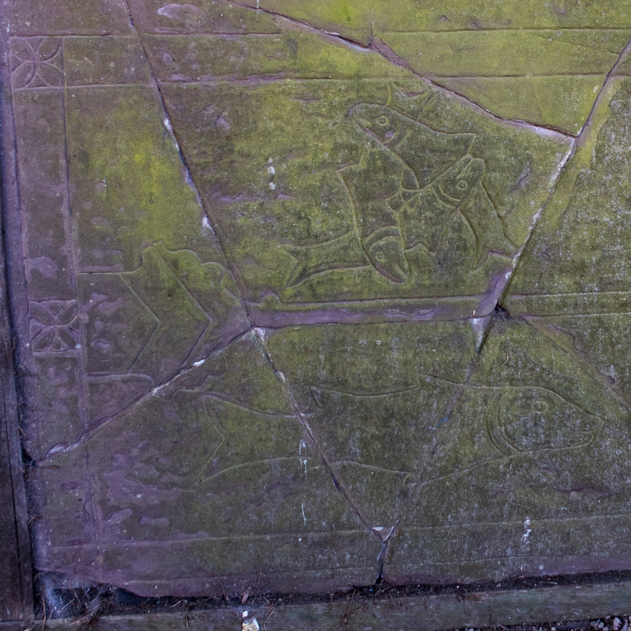 Tomb slab with trinity symbol (three intertwined fishes)