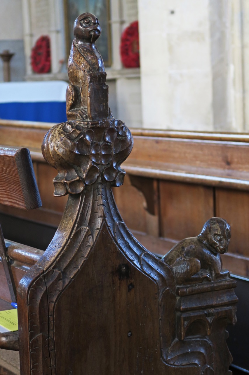 Bench end with poppy head
