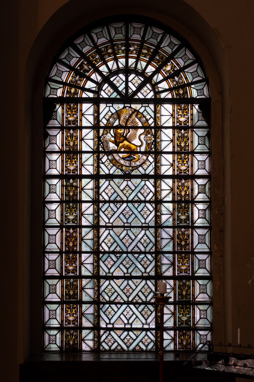 Stained glass window of St Mark’s symbol, a lion