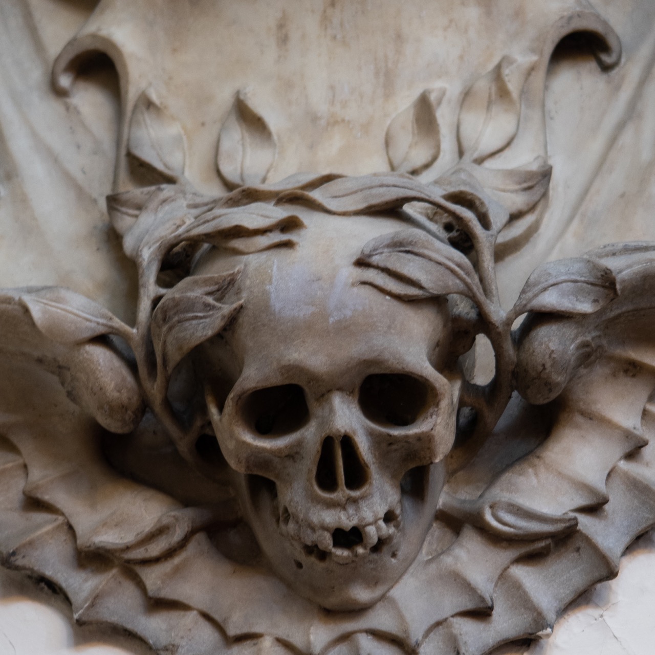 Epitaph for Joan Bence (d. 1684), scull with a foliate head motive