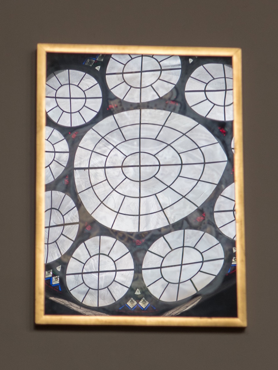 Mirror image of the rose window in the north wall