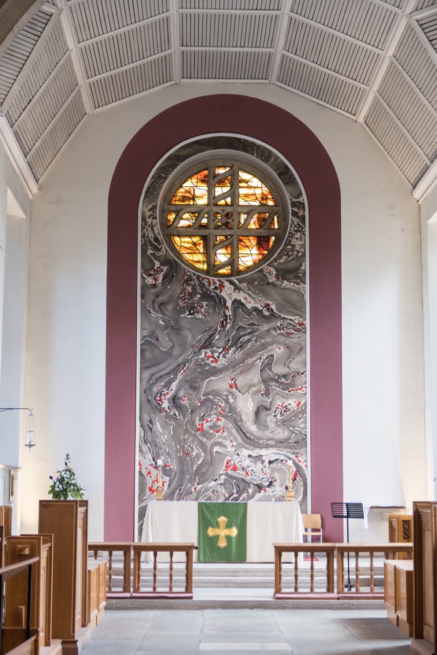 Chancel with wall painting and stained glass window (John Piper and Patrick Reyntiens, 1962)