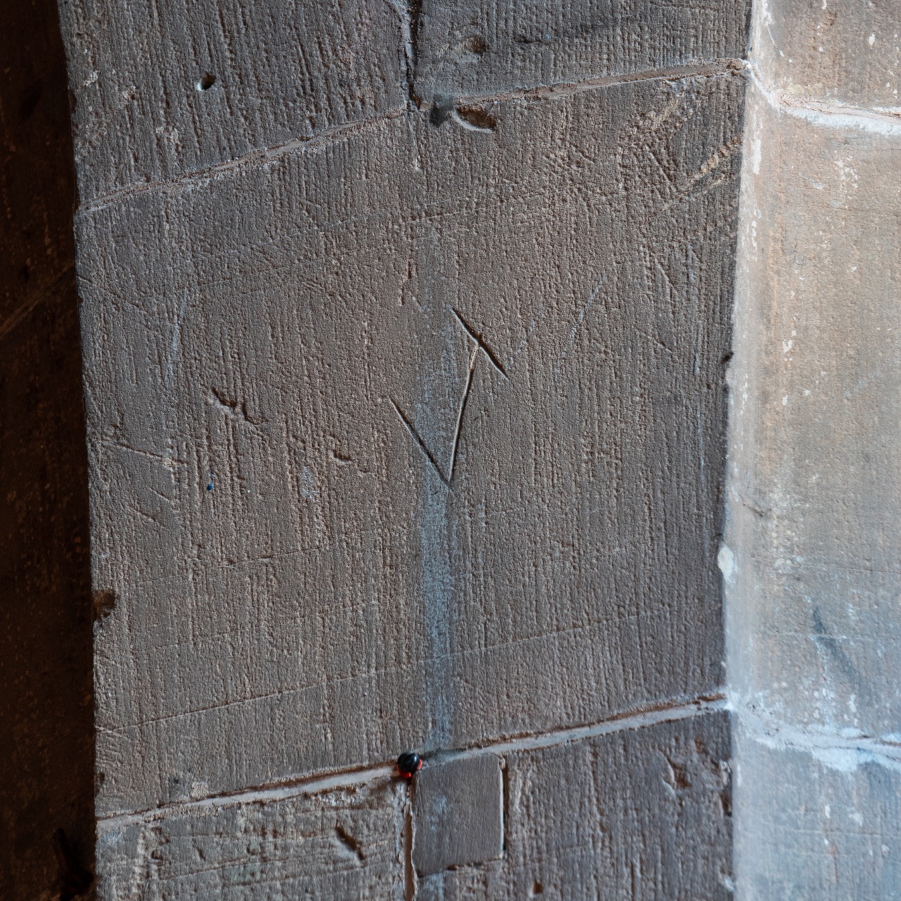 Mason’s mark on a pillar of the north arcade